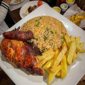 1/2 DE POLLO CON CHAUFA / CALEBS